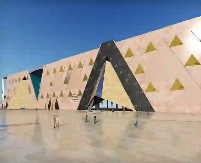 Grand Egyptian Museum near Giza Pyramids showcasing modern architecture and ancient Egyptian artifacts