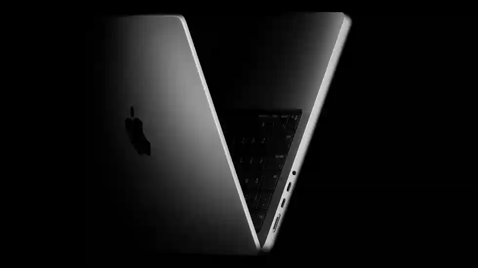 “Apple M5 chip inside a MacBook Pro showing advanced AI and GPU technology”