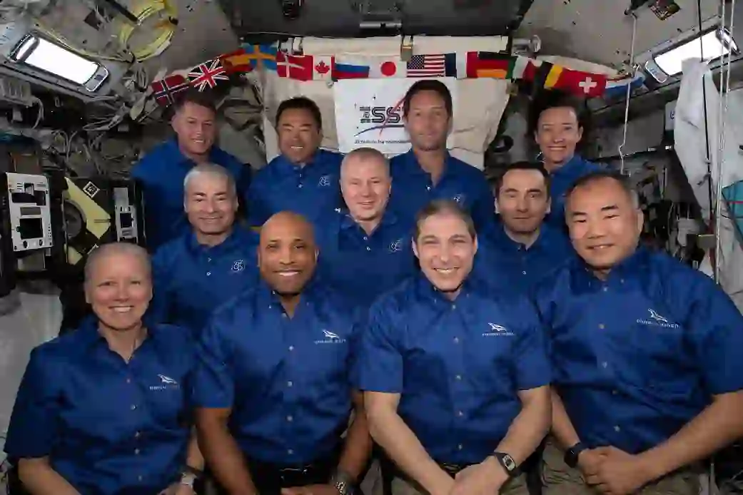 “NASA astronauts aboard the International Space Station during delayed return mission”