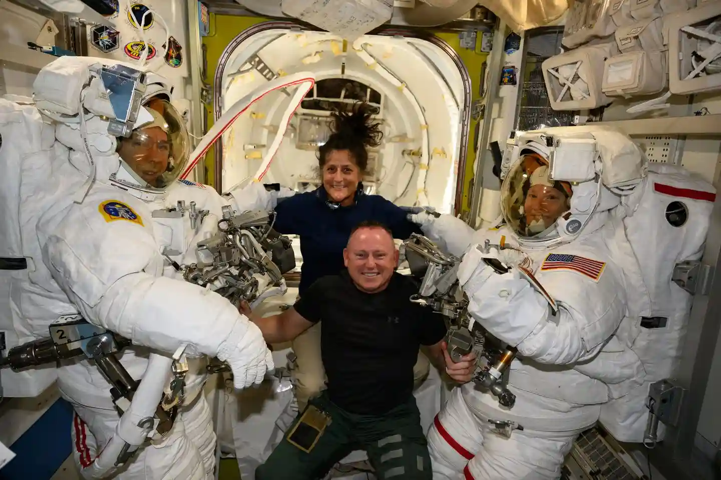 “NASA astronauts aboard the International Space Station during delayed return mission”