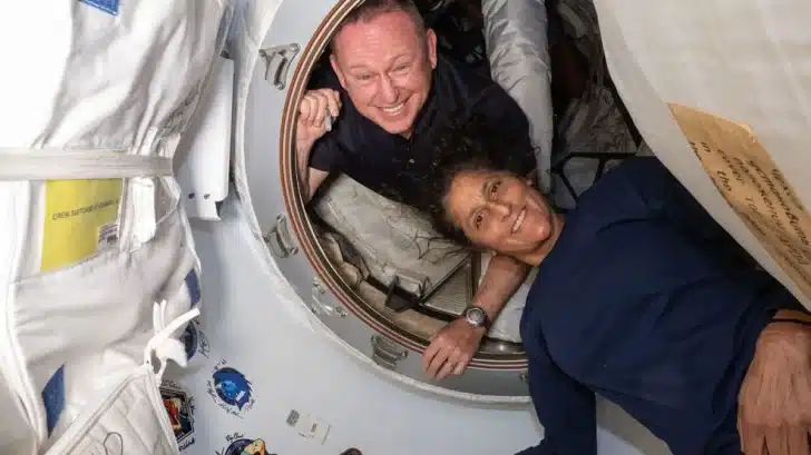 “NASA astronauts aboard the International Space Station during delayed return mission”