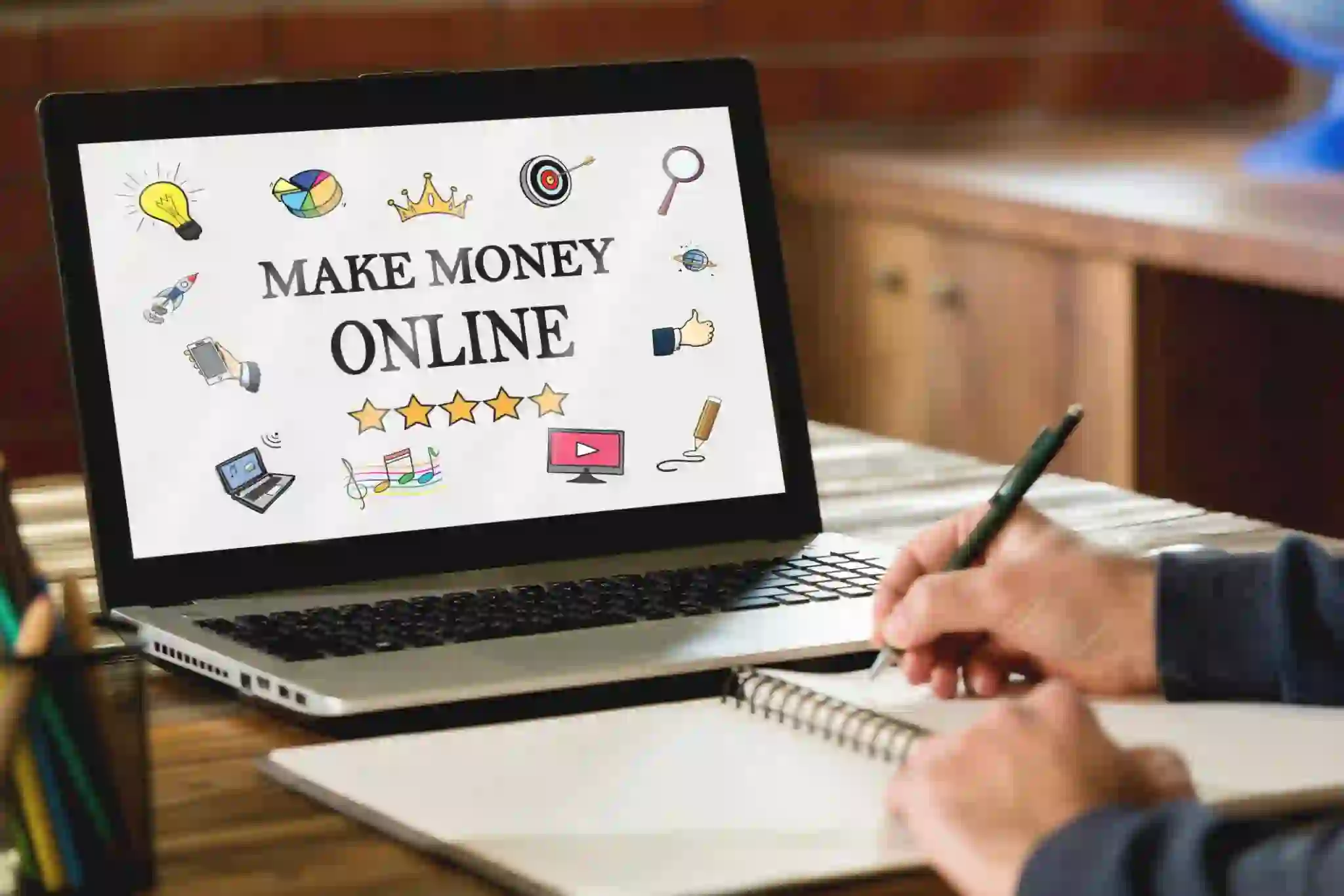“Online entrepreneur building passive income streams using digital business models”
