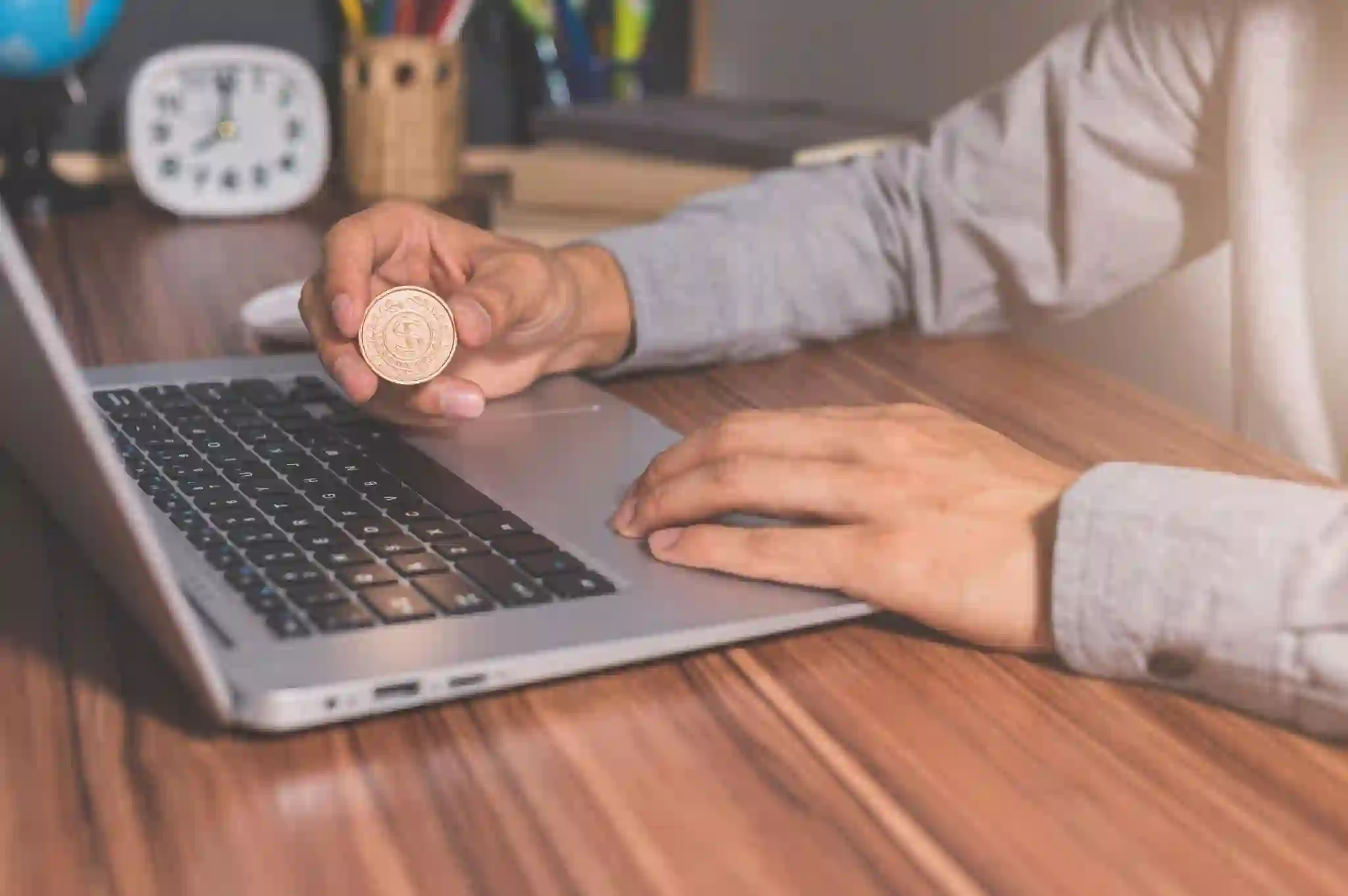 “Laptop showing passive income streams from online business and digital products”